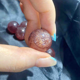 Strawberry Quartz Spheres with Strong Golden Sheen